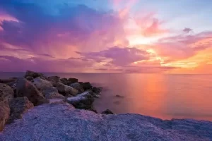 Florida ocean with purple-orange sunset